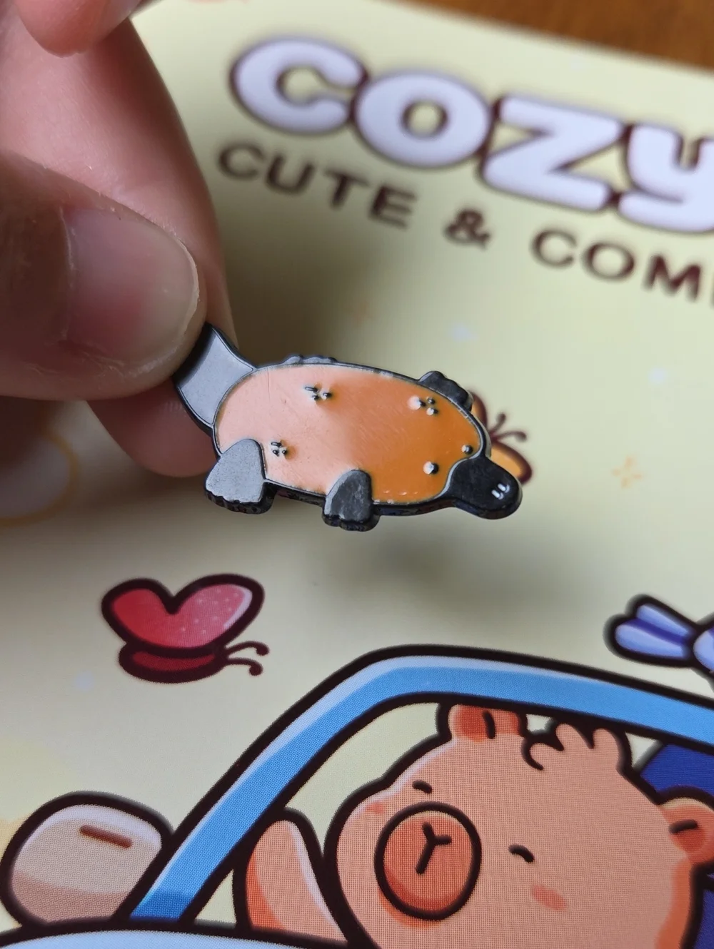 Cute Orange and Black Platypus Enamel Pin - Brand Unknown